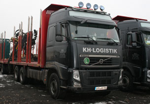 Modern Volvo-Truck with modern loading technology for transporting of round wood 